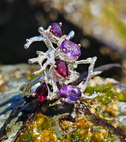 Gemstones Entangled in Coral