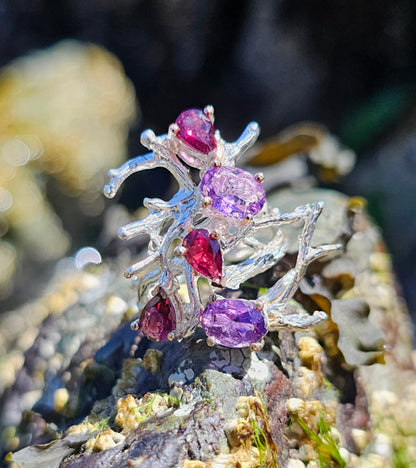 Gemstones Entangled in Coral