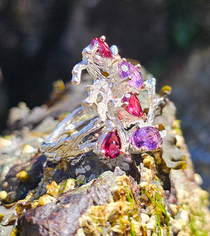 Gemstones Entangled in Coral